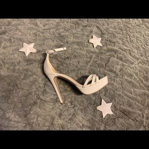 One inch shiny white platforms.